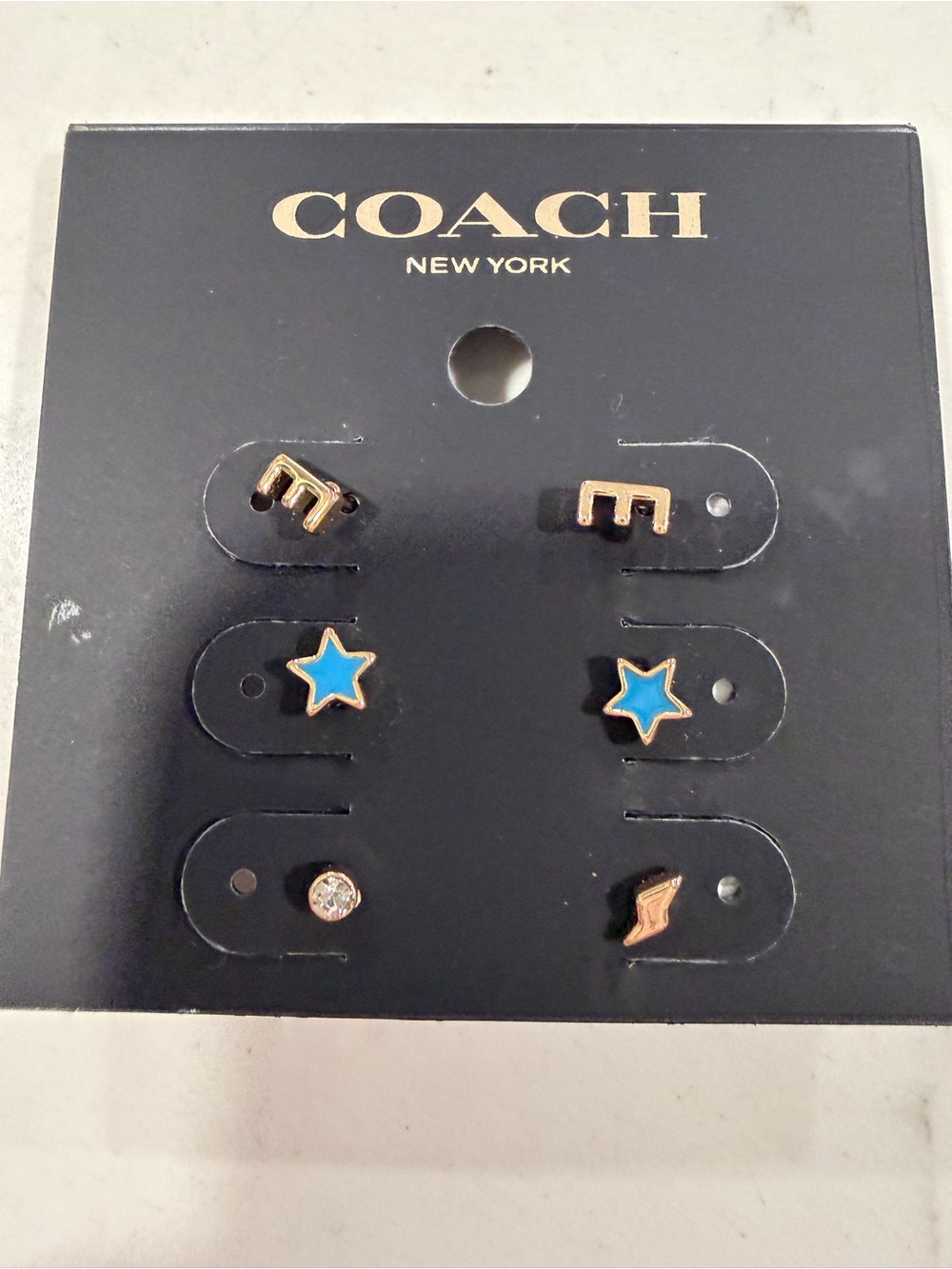 Coach Gold-Tone Stud Earring Set with Blue Star Accents